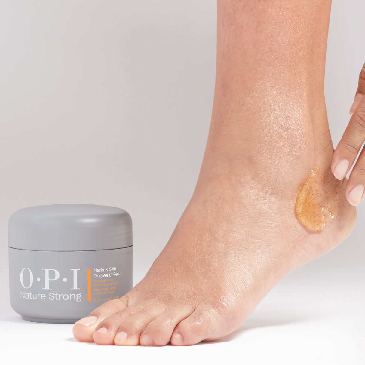 OPI Nature Strong Nails & Skin - Hand & Foot Scrub 250ml Product Application On The Heel View
