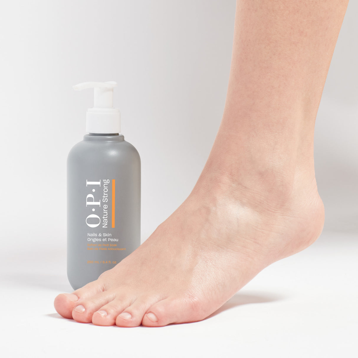 OPI Nature Strong Nails & Skin - Pedi Soak 250ml Bottle With Feet View