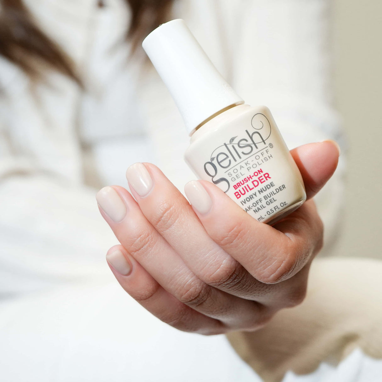 Gelish Brush On Builder Gel - Ivory Nude 15ml 0.5oz Bottle In Hand