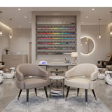 Lexor Stationary Customer Chair 2.6 - Claystone and Ivory colour on a background within a nail Salon Demo