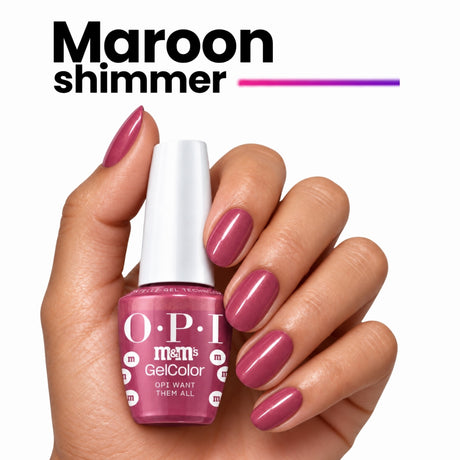 OPI Intelli-Gel | OPI Want Them All (GCT HP T09) Hand With Bottle Showing The Maroon Shimmer Shade On The Finger Nails