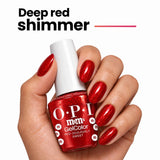 OPI Intelli-Gel | Red-iculously Sweet (GCT HP T12) Hand With Bottle Showing The Deep Red Shimmer Shade On The Finger Nails