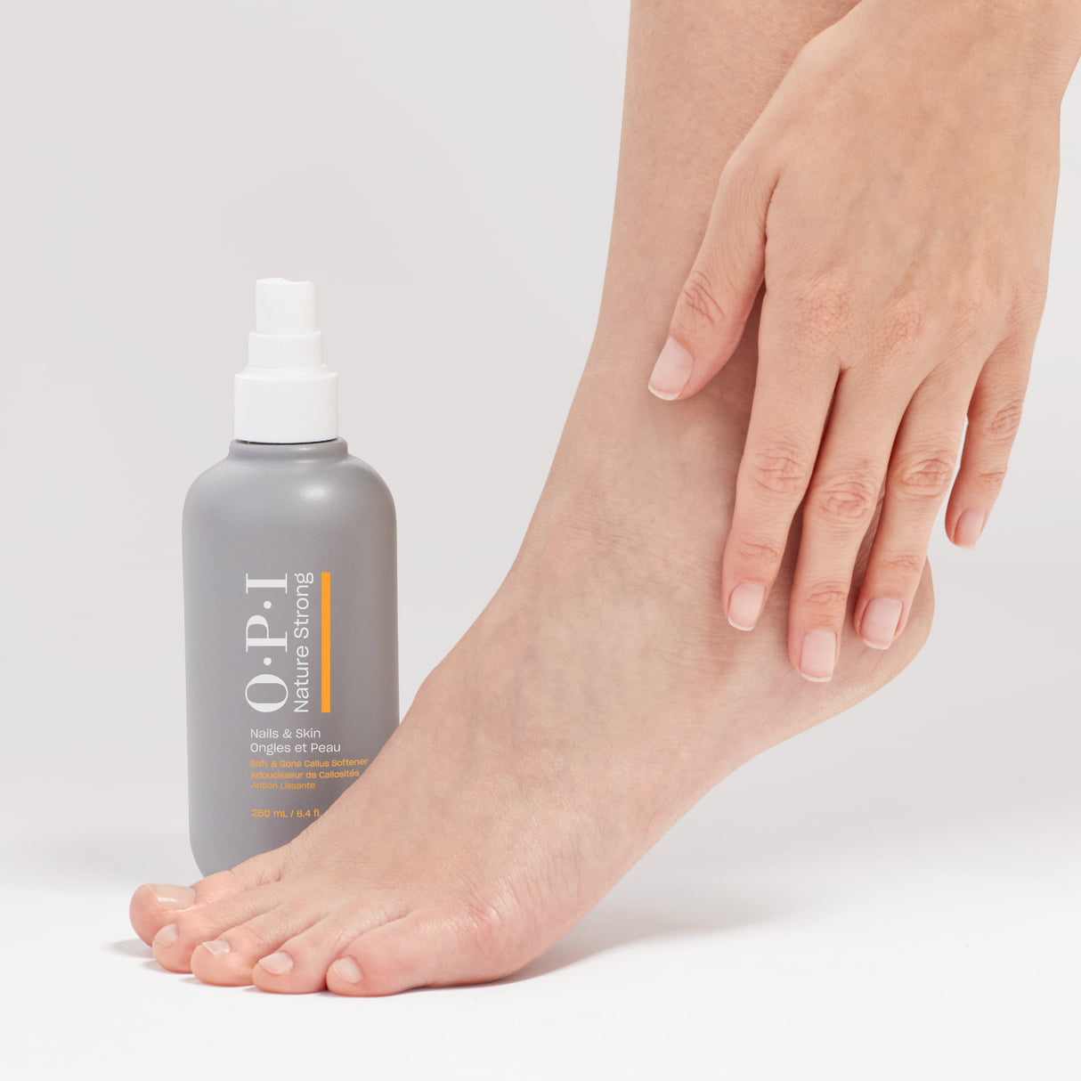 OPI Nature Strong Nails & Skin - Callus Softener 250ml - Bottle With Feet View